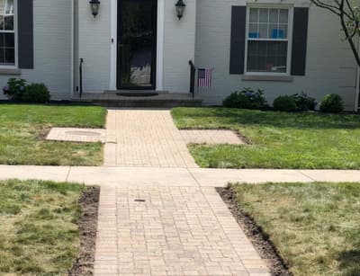 Charming Front Yard Walkway by Expert Landscapers